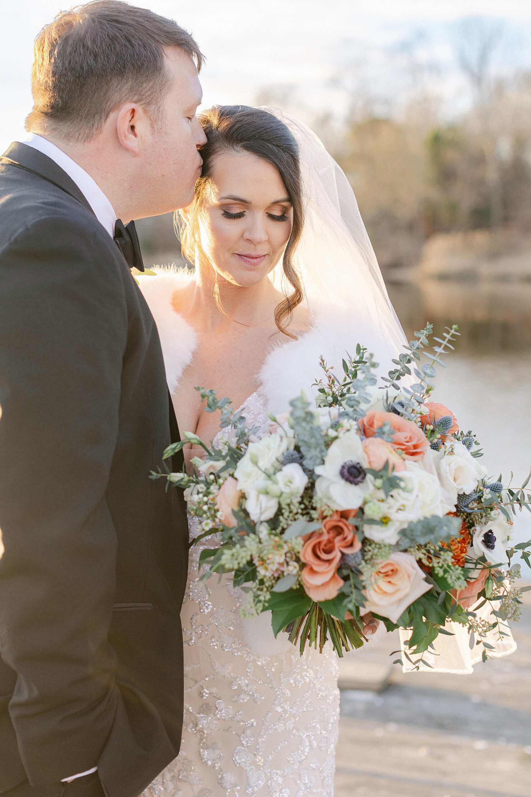 coral, green, white bridal bouquet winter