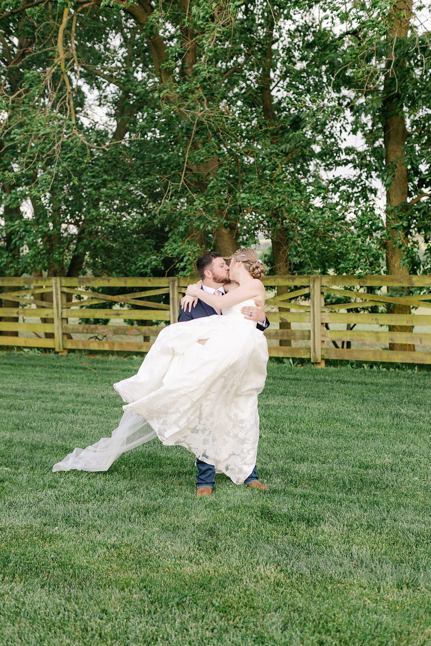 baby carry bride groom pose
