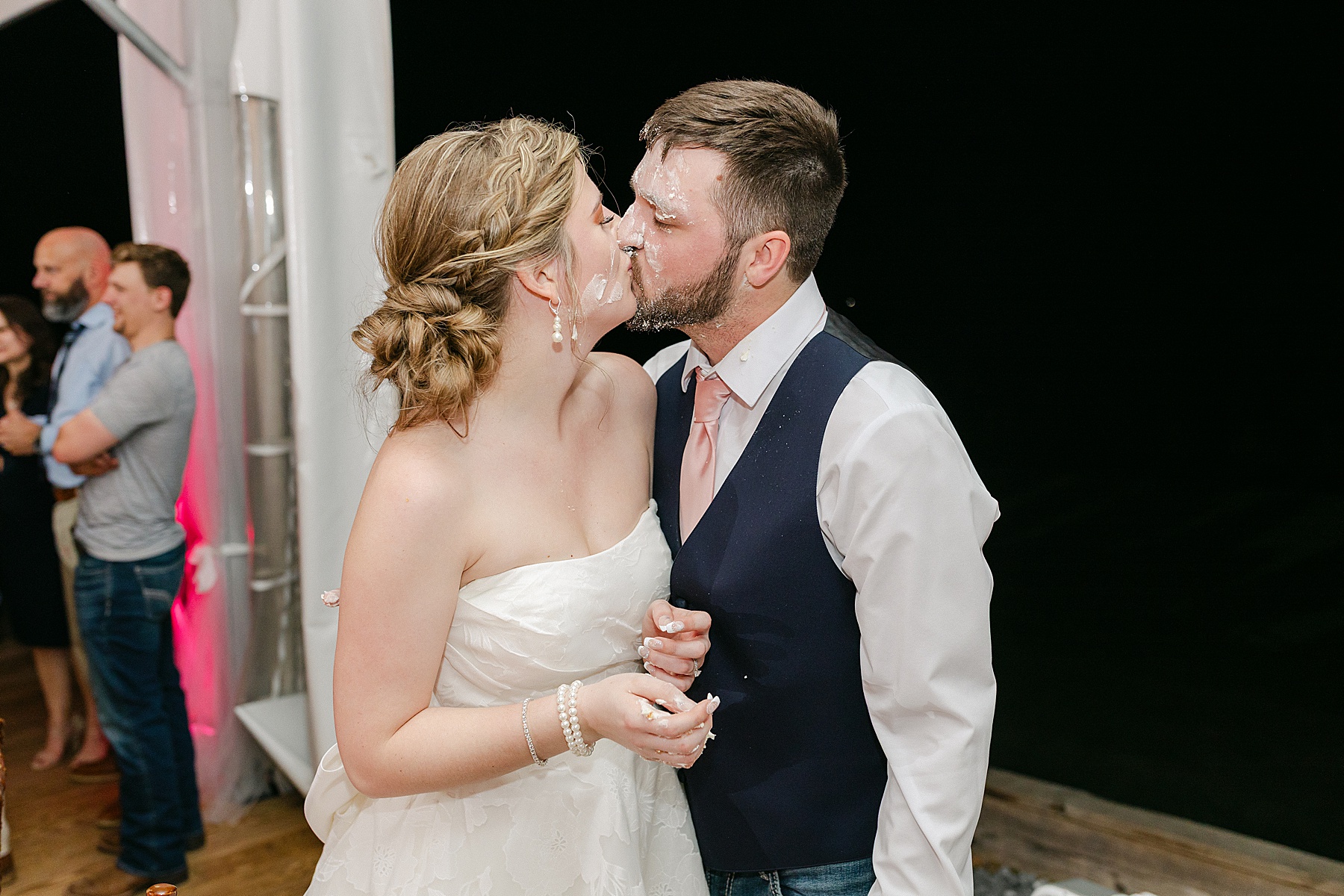 wedding day cake smash kiss