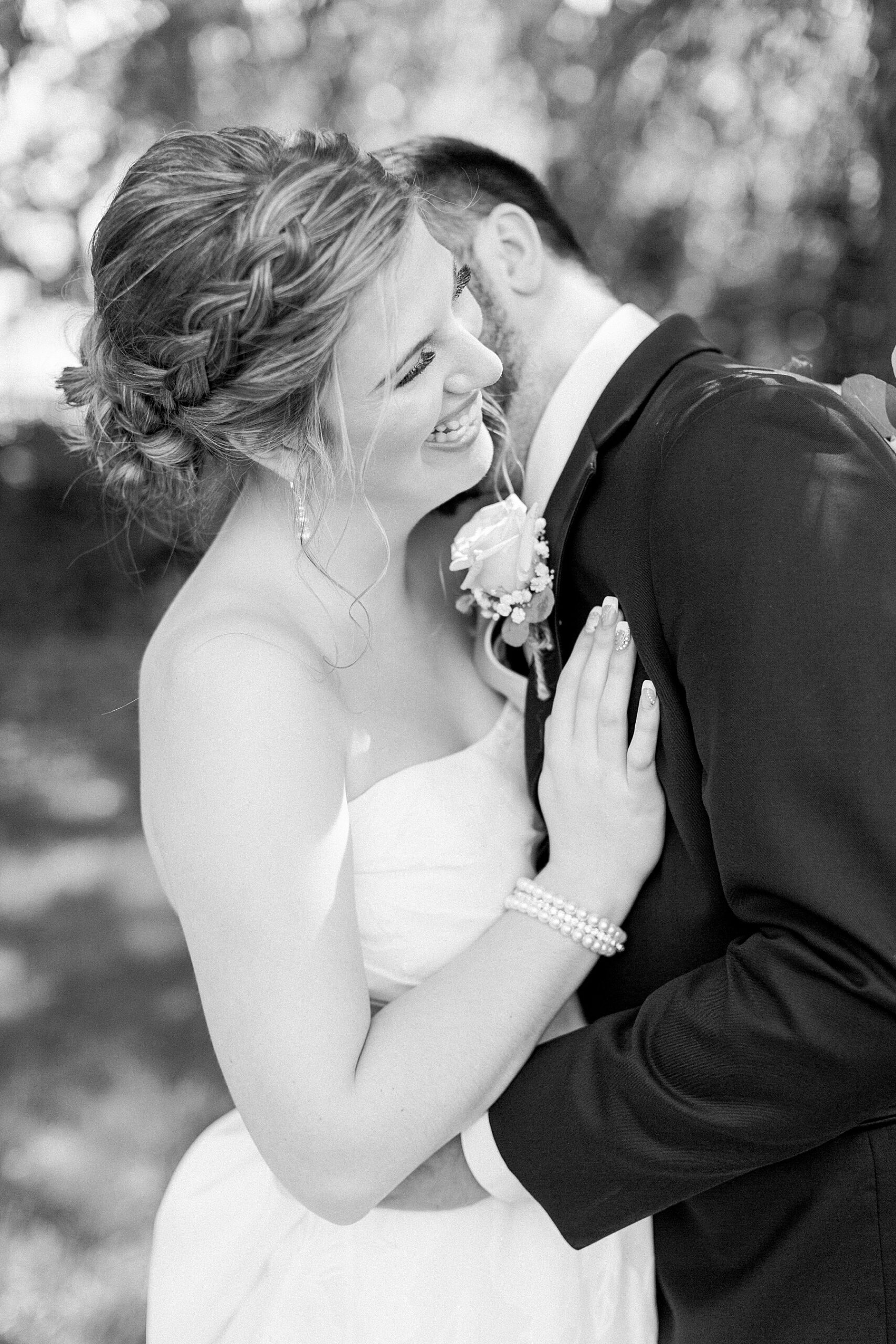 black and white bride groom snuggle