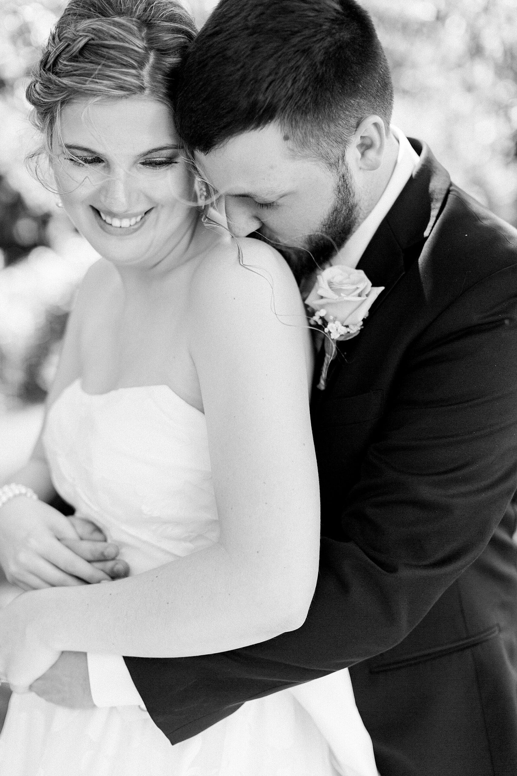bride groom black and white snuggle