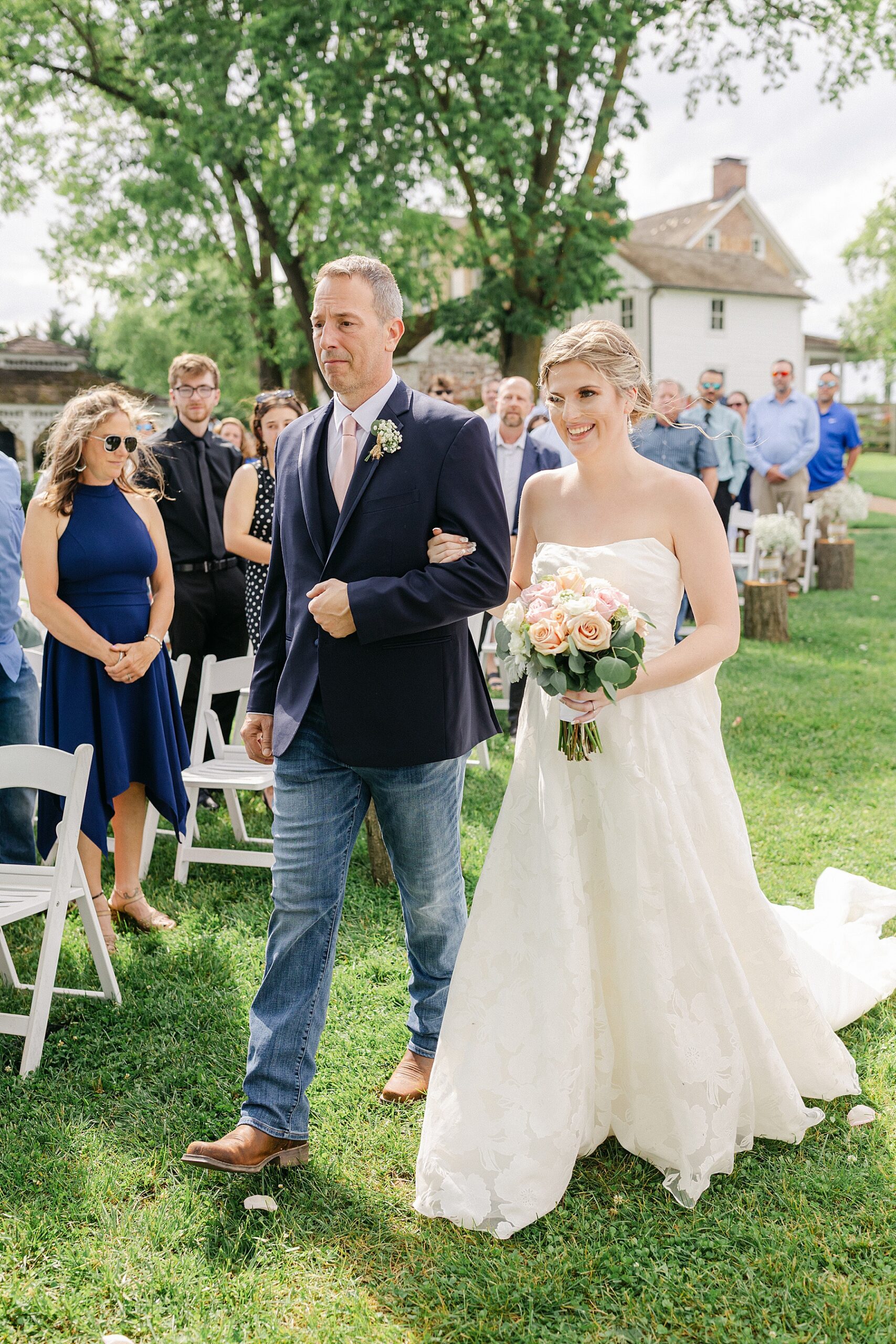 father walking bride down the aisle walkers ceremony site