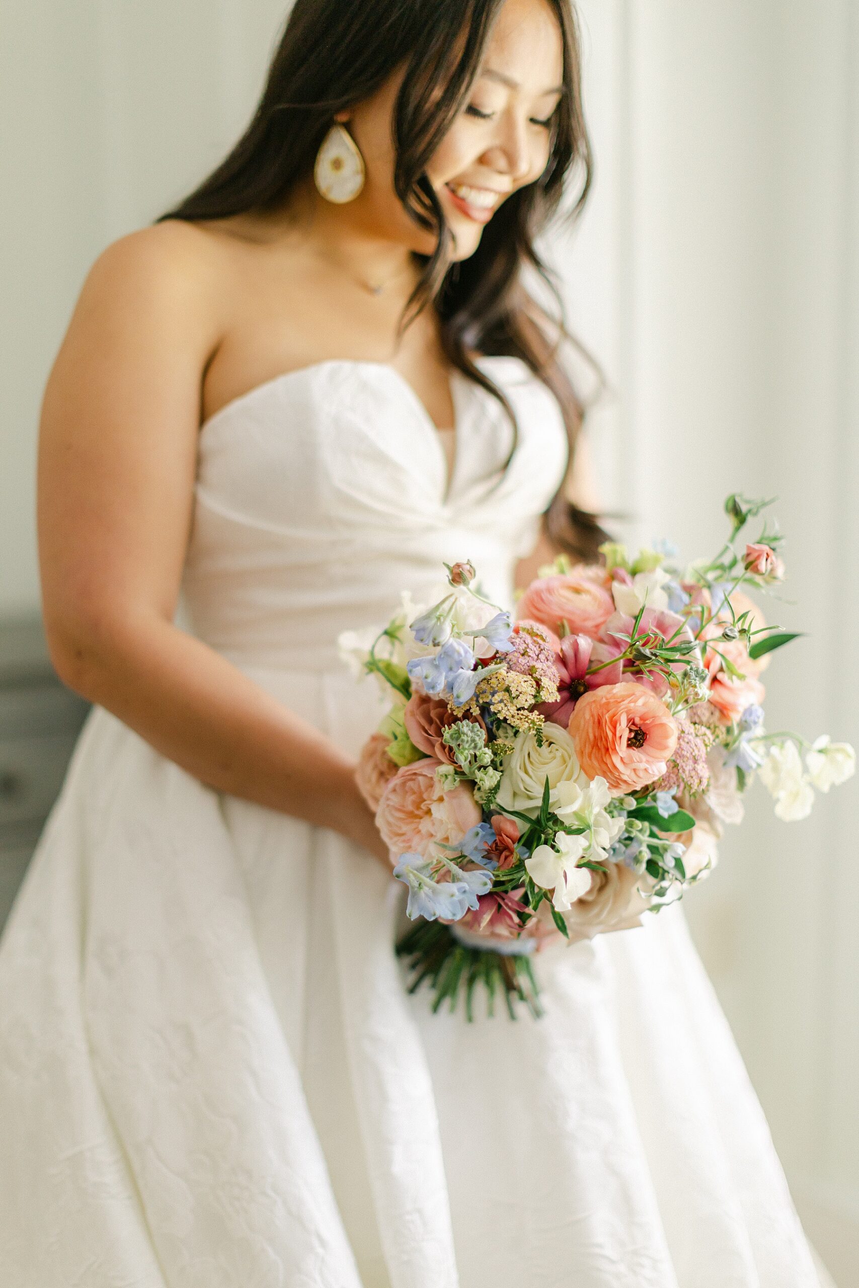 coral blue green wedding bouquet