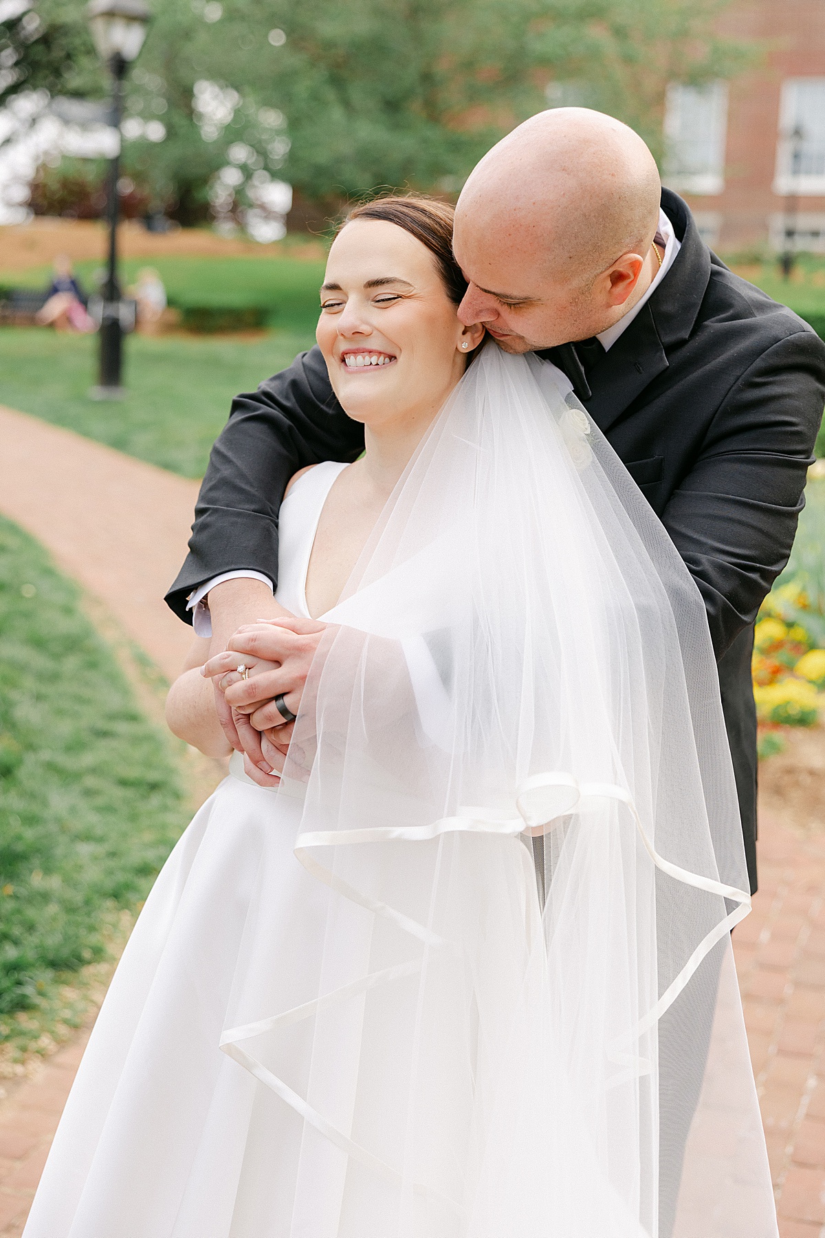Couple candid laugh during portraits Annapolis Maryland spring wedding — Brittany Thomas Photography