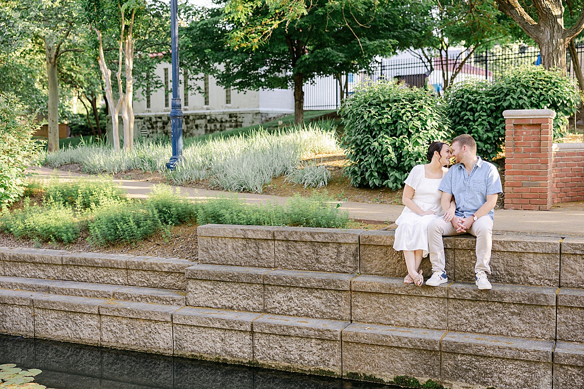 Laura and Ryan laughing candid engagement portrait downtown Frederick Maryland — Brittany Thomas Photography