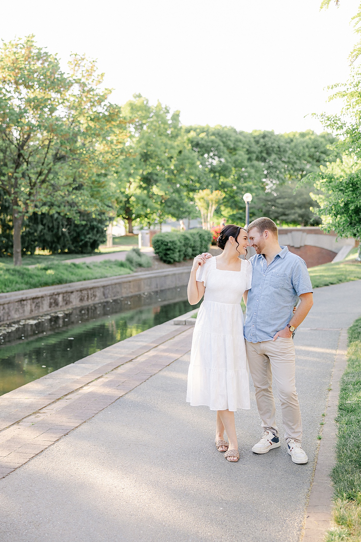 Flirty couple portrait downtown Frederick Maryland engagement session — Brittany Thomas Photography