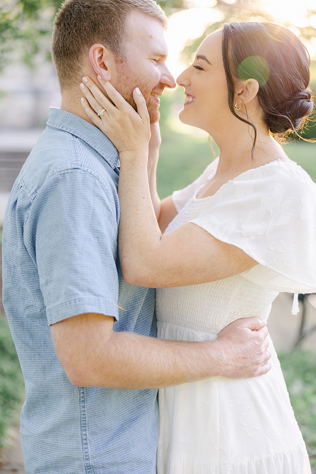 Candid laugh Baker Park fountain downtown Frederick Maryland engagement session — Brittany Thomas Photography