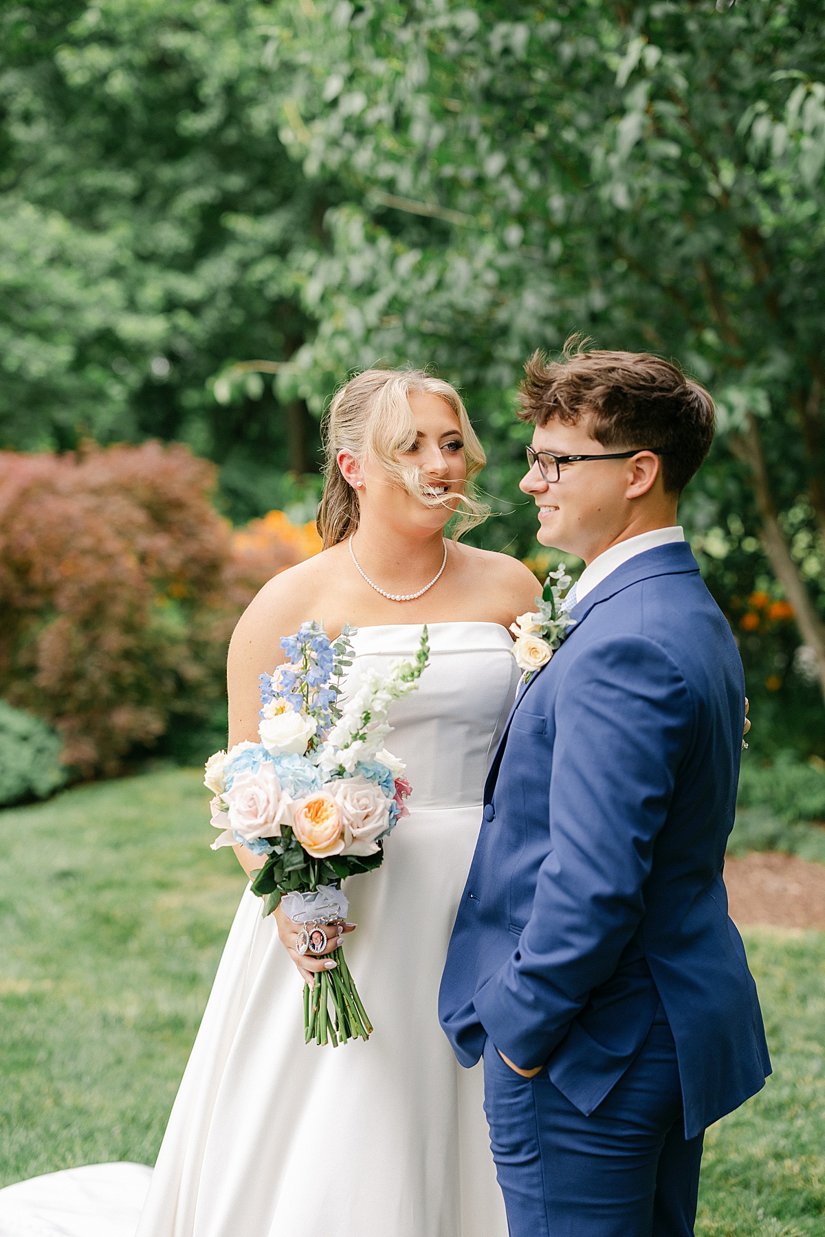 Bride laughing during summer wedding portraits at historic Maryland manor | Brittany Thomas Photography Maryland Wedding Photographer