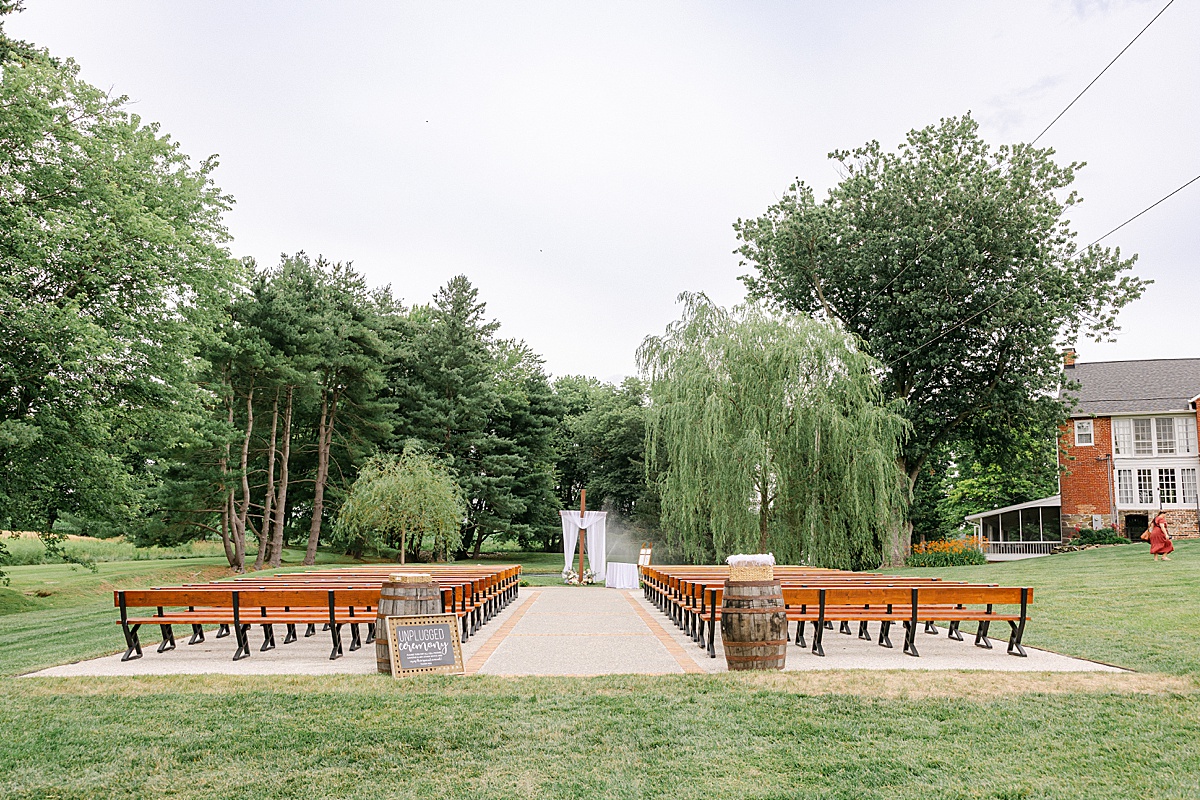 Outdoor garden ceremony space at The Christian Royer House in early summer | Brittany Thomas Photography Maryland Wedding Photographer