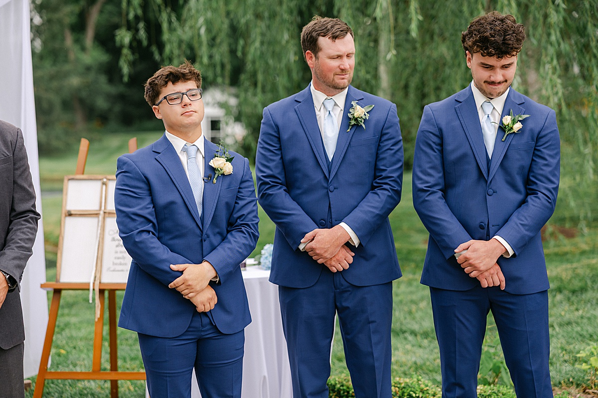 Groom emotional as bride approaches during outdoor summer wedding ceremony | Brittany Thomas Photography Maryland Wedding Photographer
