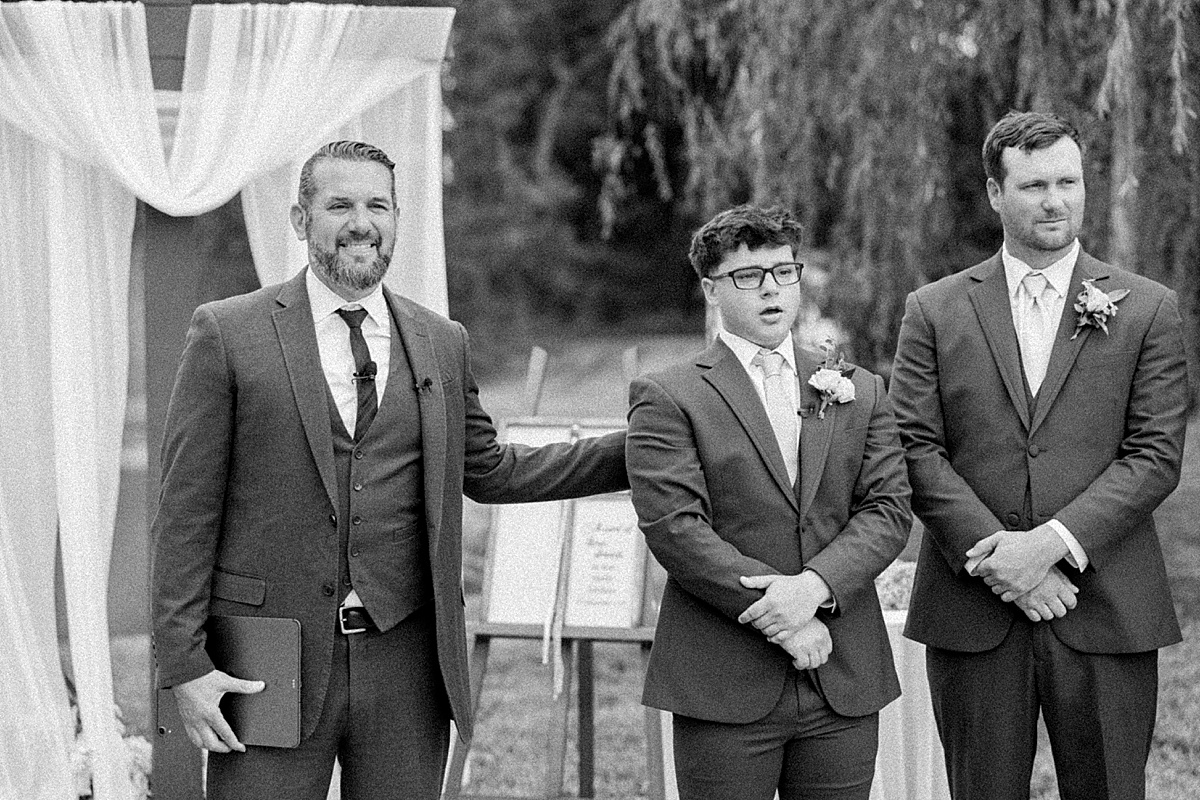 Groom wiping tears during wedding ceremony at Christian Royer House | Brittany Thomas Photography Maryland Wedding Photographer