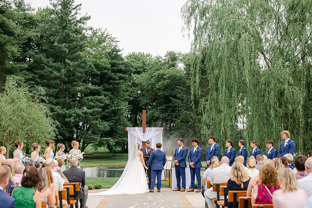 Bride and groom exchanging vows at The Christian Royer House summer wedding | Brittany Thomas Photography Maryland Wedding Photographer