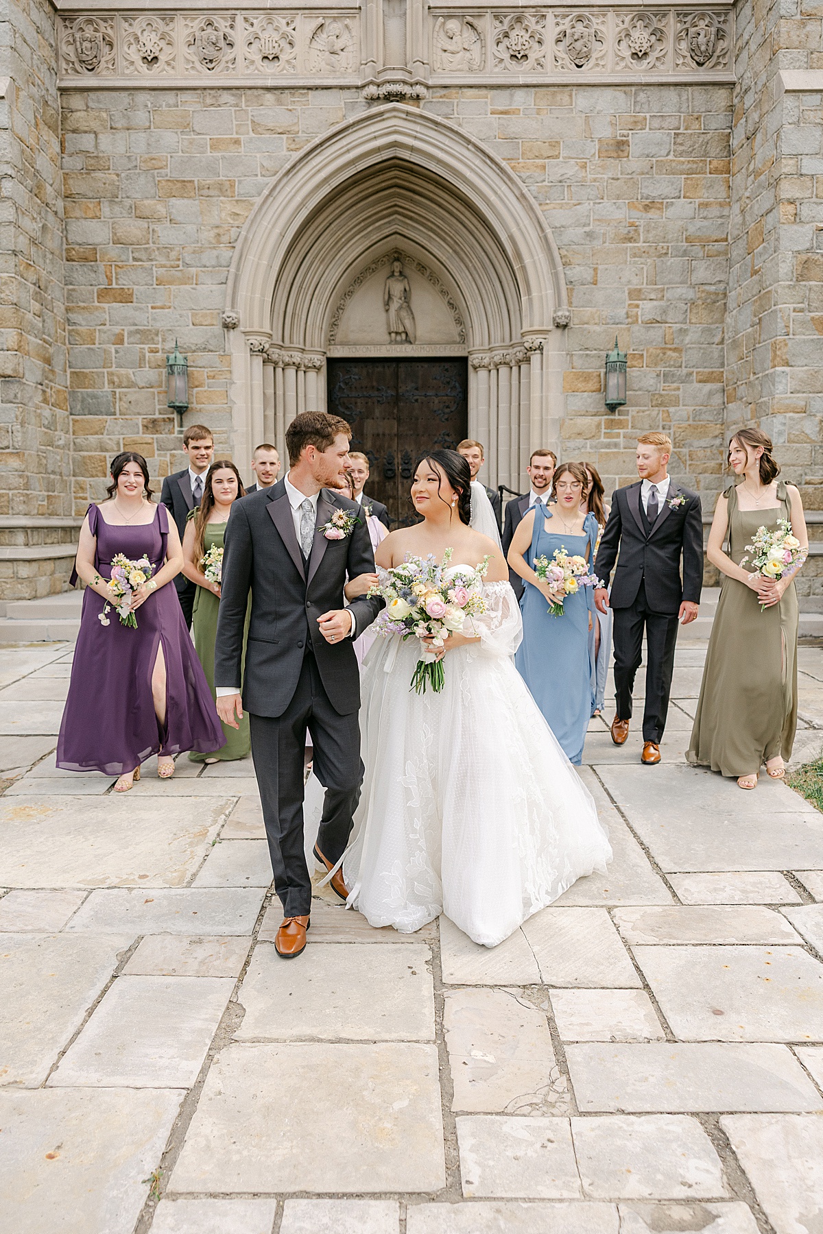 Colorful bridal party in green lavender dusty blue and purple dresses at Mercersburg Academy Pennsylvania wedding | Brittany Thomas Photography Maryland Wedding Photographer